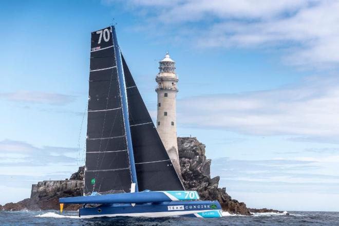 First around the Fastnet Rock and Multihull Line Honours for Tony Lawson's MOD70 Concise 10 ©  Rolex/ Kurt Arrigo http://www.regattanews.com